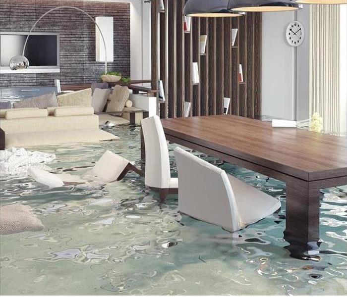 A water flood in an office that has a conference table